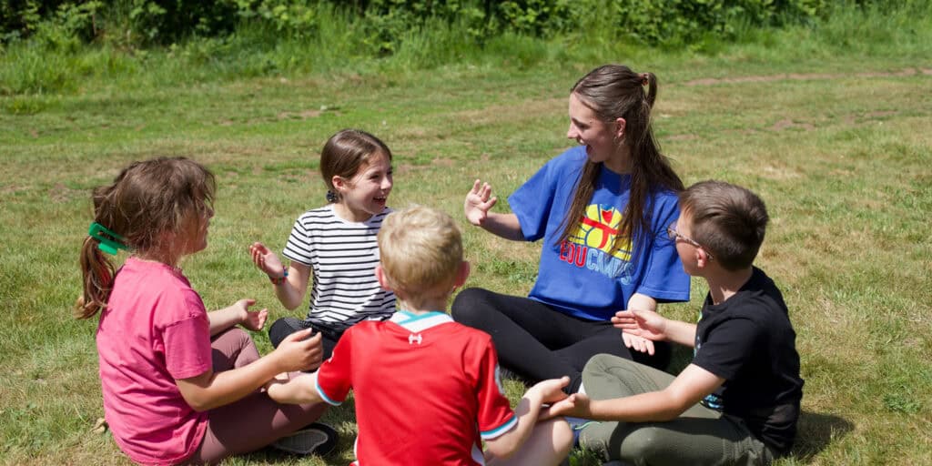 Children having fun at an Educamps Summer Camp playing group activities